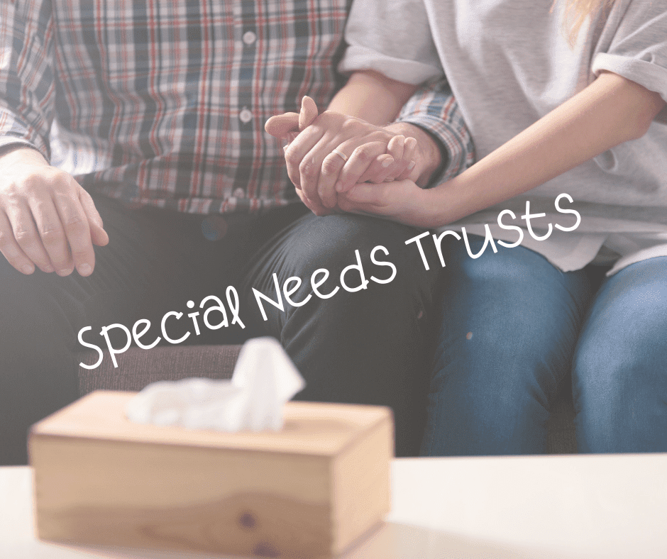 couple holding hands with words special needs trusts in front of them